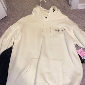 Super cute Pray sweatshirt ! Never worn